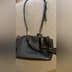 Black Tory Burch crossbody satchel with tassel
